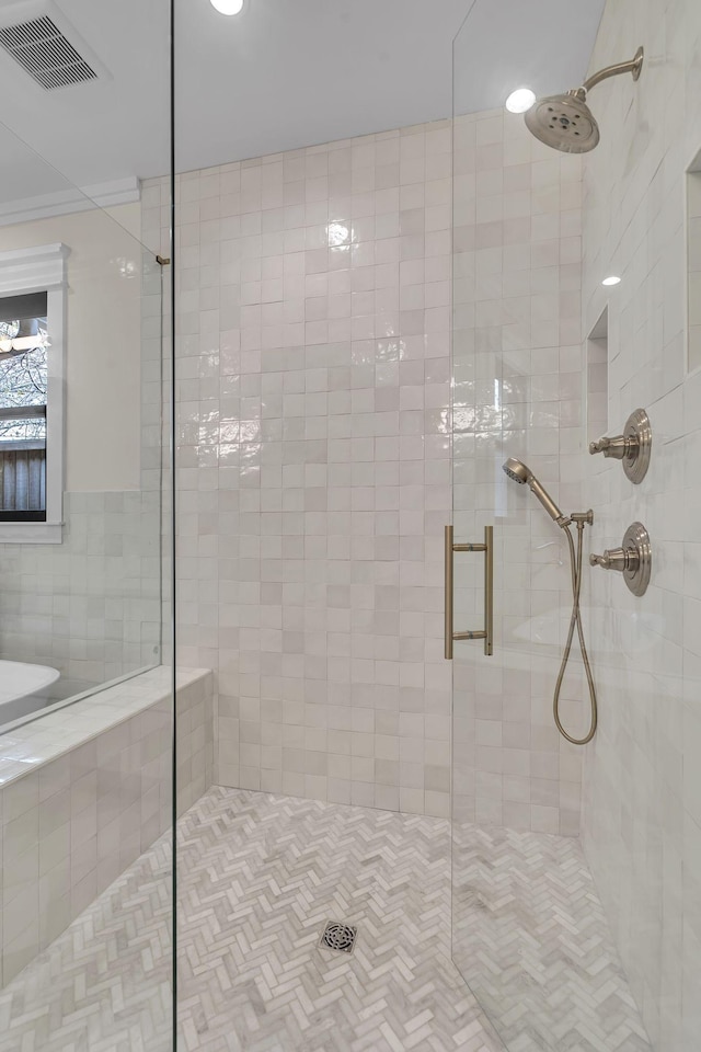 bathroom with an enclosed shower