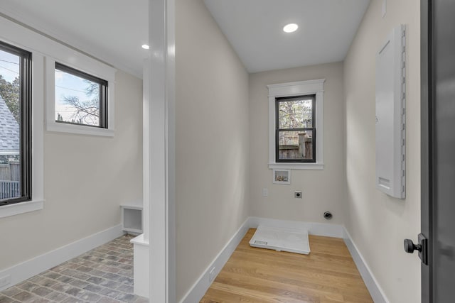 laundry area with hookup for an electric dryer and hookup for a washing machine