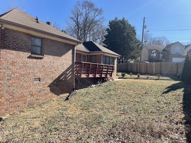 view of yard with a deck