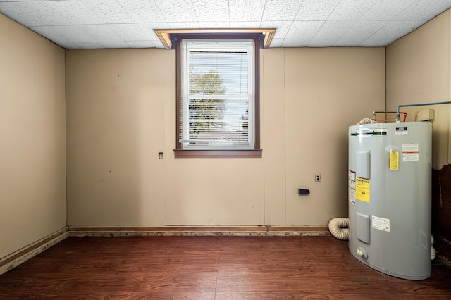 utility room featuring electric water heater