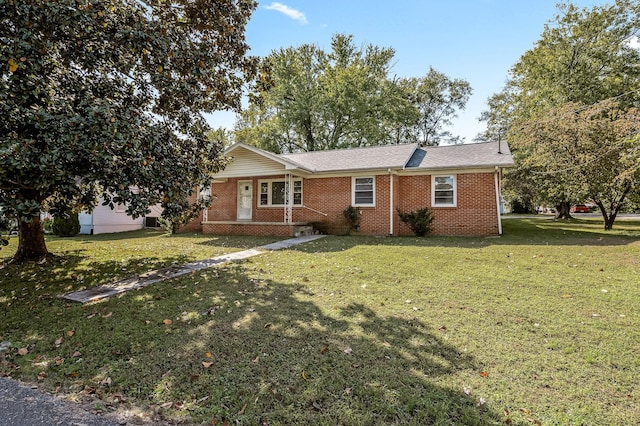 single story home with a front yard