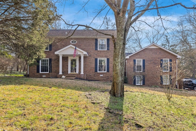 view of front of home featuring a front yard