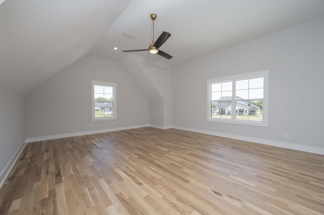 additional living space featuring ceiling fan, light hardwood / wood-style floors, and lofted ceiling