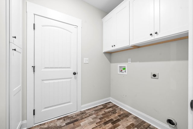 laundry room featuring hookup for a washing machine, cabinets, and hookup for an electric dryer