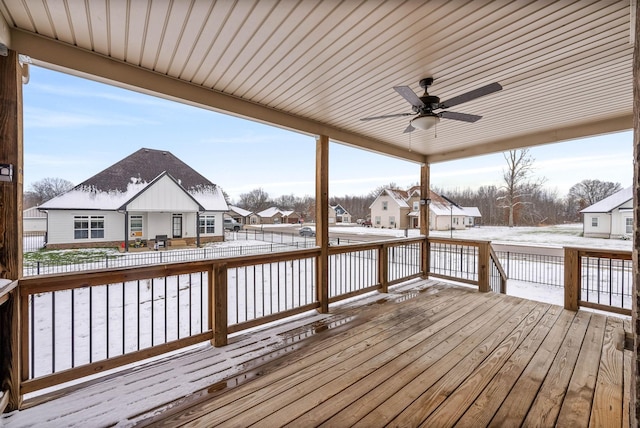 snow covered deck featuring ceiling fan