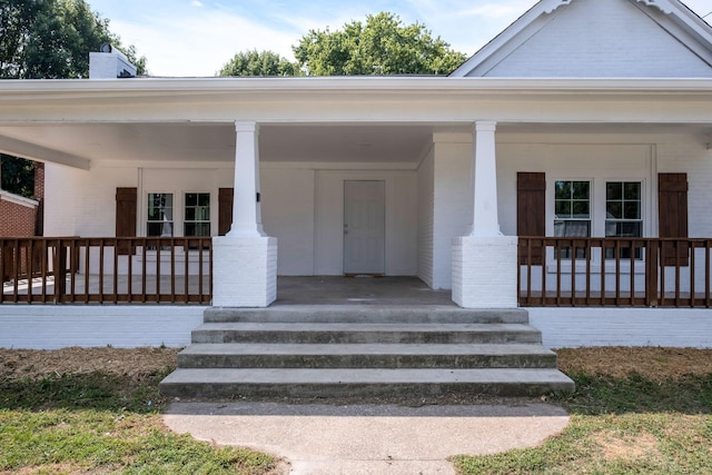 property entrance with a porch