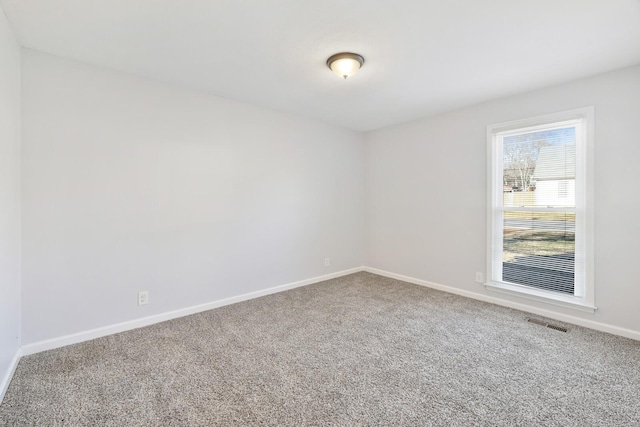 view of carpeted spare room