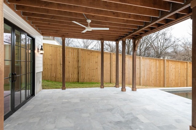 view of patio / terrace featuring ceiling fan