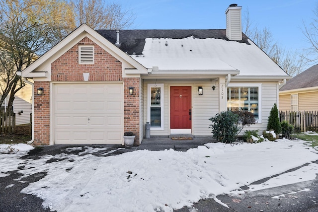 view of front of home with a garage