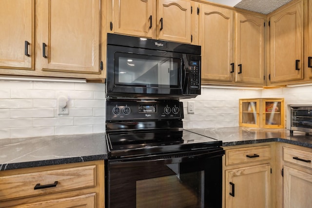 kitchen featuring black appliances, light brown cabinetry, and tasteful backsplash