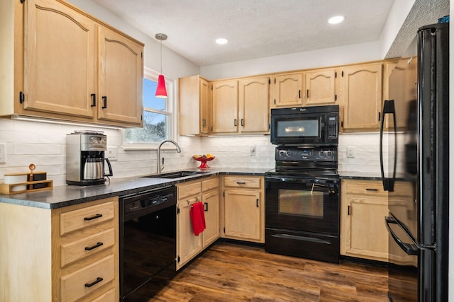 kitchen with light brown cabinetry, sink, dark hardwood / wood-style floors, and black appliances