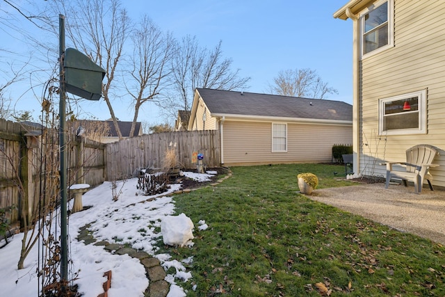 view of yard covered in snow