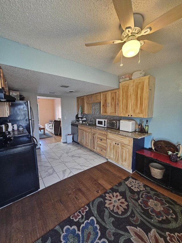 kitchen with decorative backsplash, stainless steel dishwasher, a textured ceiling, ventilation hood, and black electric range oven