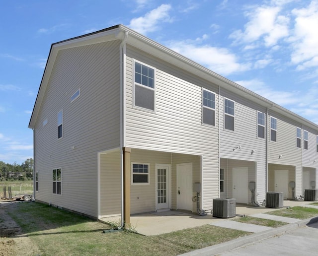 exterior space featuring central AC and a patio area