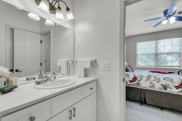 bathroom featuring ceiling fan and vanity