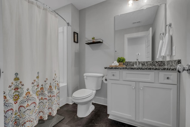 full bathroom with shower / tub combo with curtain, vanity, and toilet