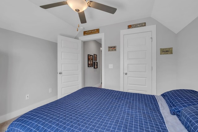 bedroom with ceiling fan and lofted ceiling