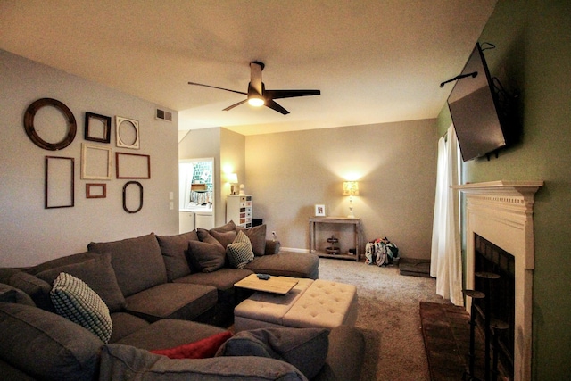 living room with carpet floors and ceiling fan