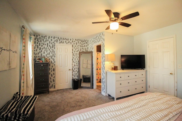 carpeted bedroom featuring ceiling fan