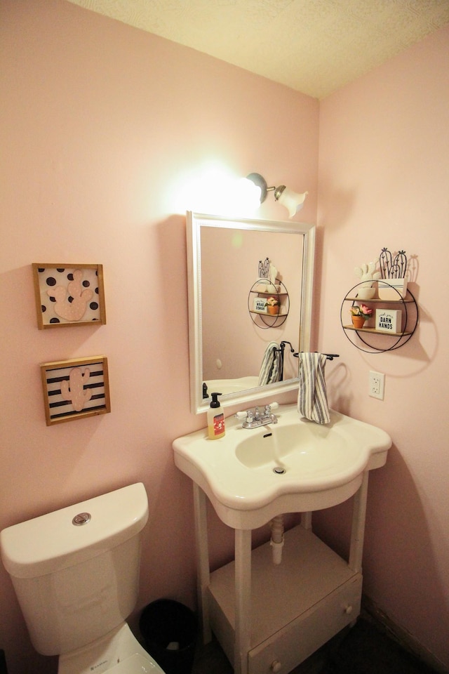 bathroom featuring toilet