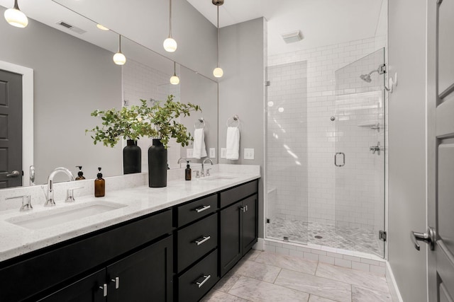 bathroom with vanity and walk in shower