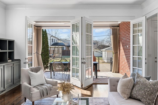 doorway to outside featuring french doors and dark hardwood / wood-style flooring