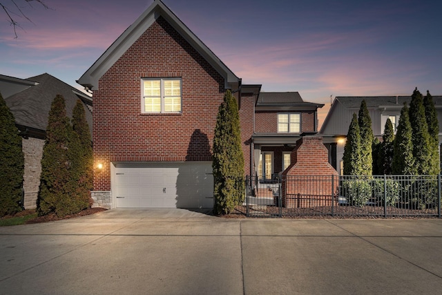 view of property featuring a garage