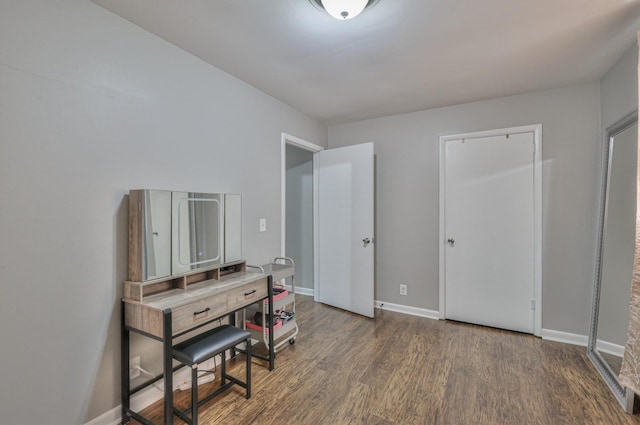 miscellaneous room with dark hardwood / wood-style floors