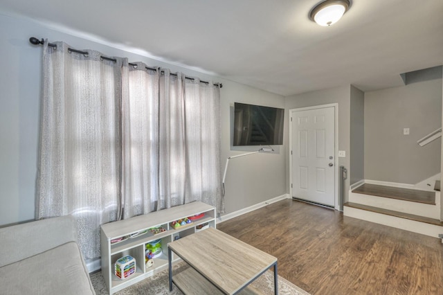 foyer with dark hardwood / wood-style floors