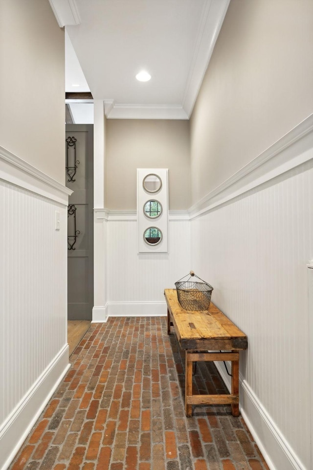 hallway featuring crown molding