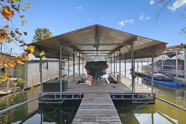 dock area with a water view