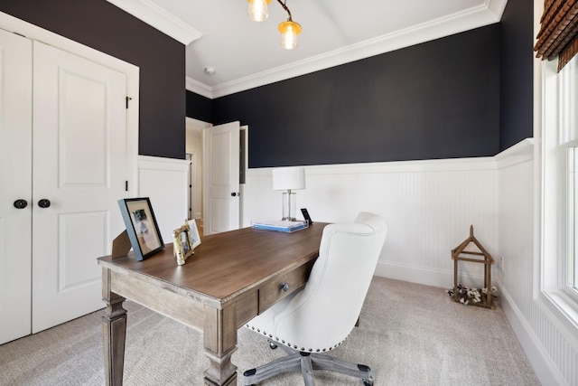 office area featuring a wealth of natural light, crown molding, and light carpet