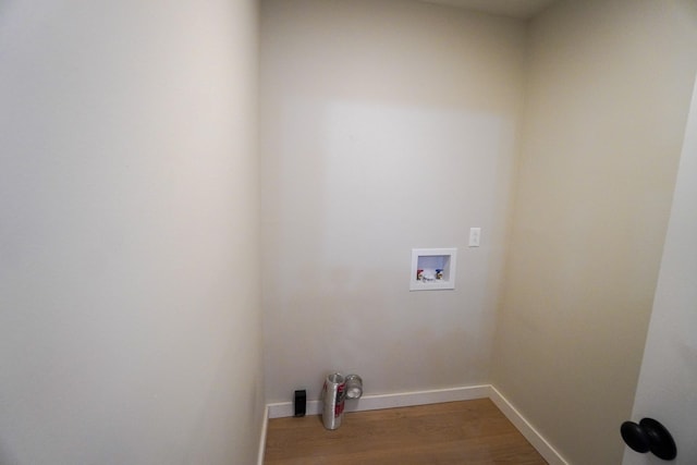 washroom featuring hardwood / wood-style floors and hookup for a washing machine