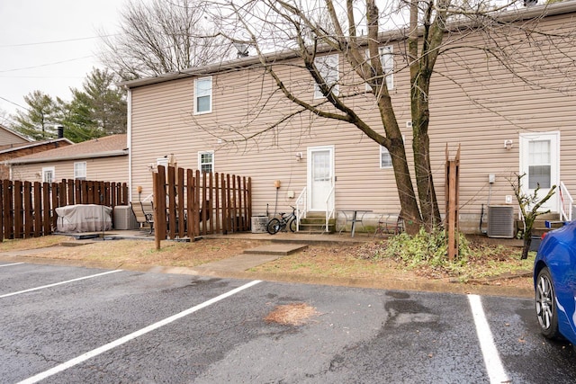 rear view of house with central AC