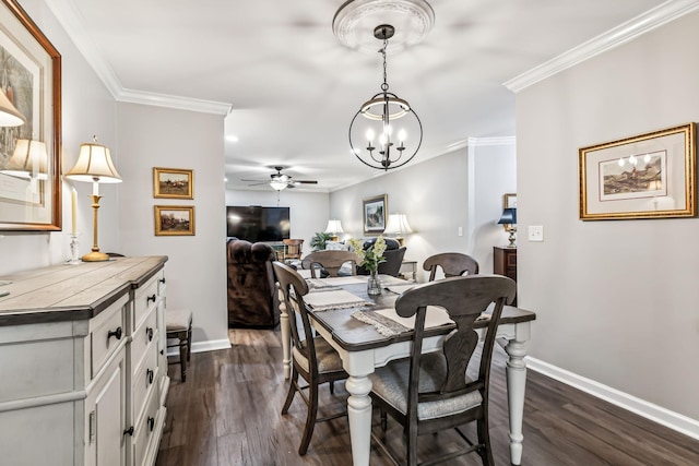 dining area with crown molding, dark hardwood / wood-style flooring, and ceiling fan with notable chandelier