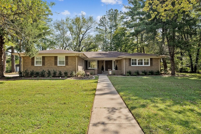 ranch-style home with a front lawn