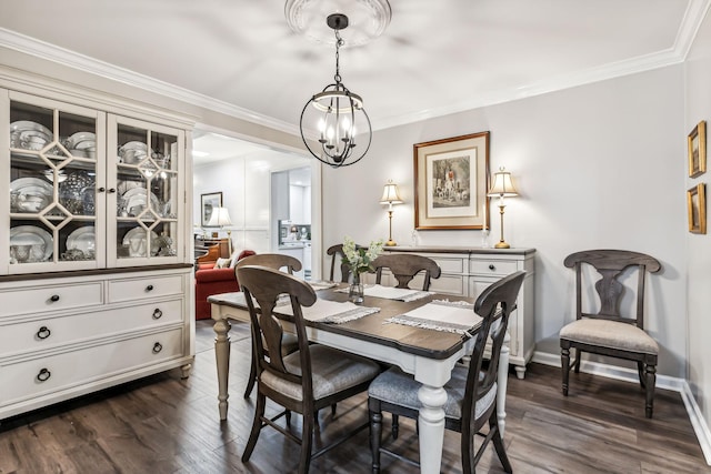 dining space featuring a chandelier, dark hardwood / wood-style floors, and ornamental molding