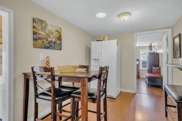 dining room featuring hardwood / wood-style flooring