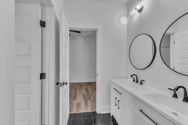 bathroom with tile patterned floors and vanity