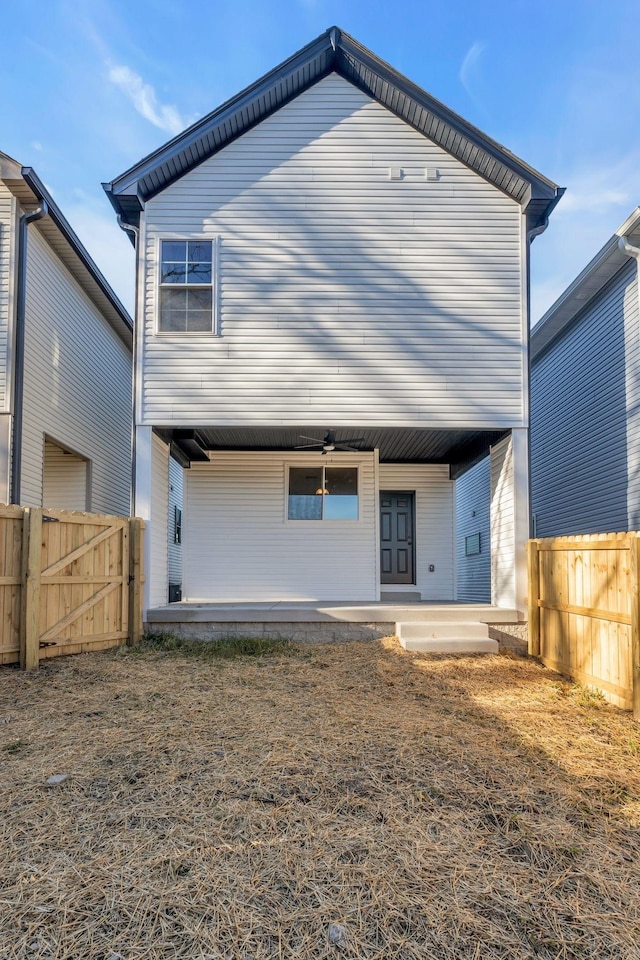 rear view of house with a patio