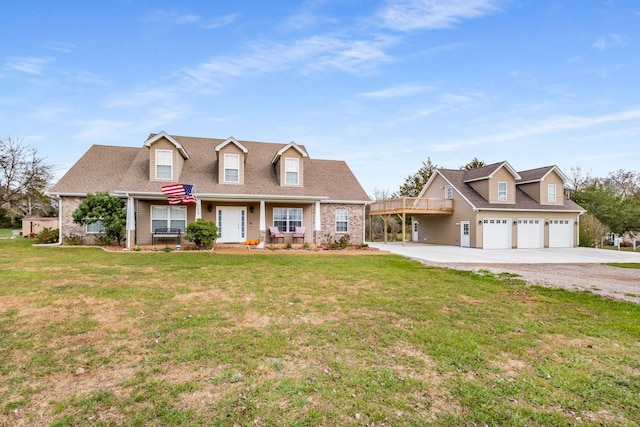 cape cod home with a porch, a garage, and a front lawn