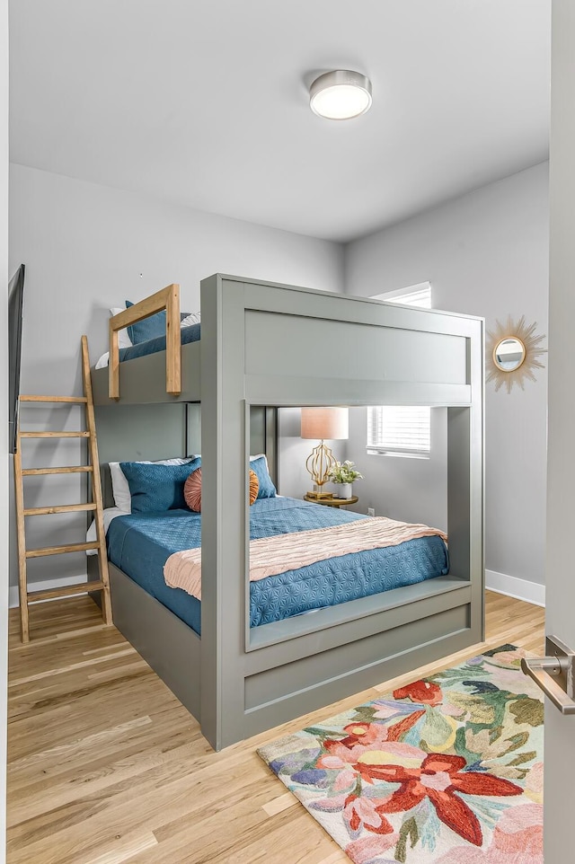 bedroom featuring hardwood / wood-style floors