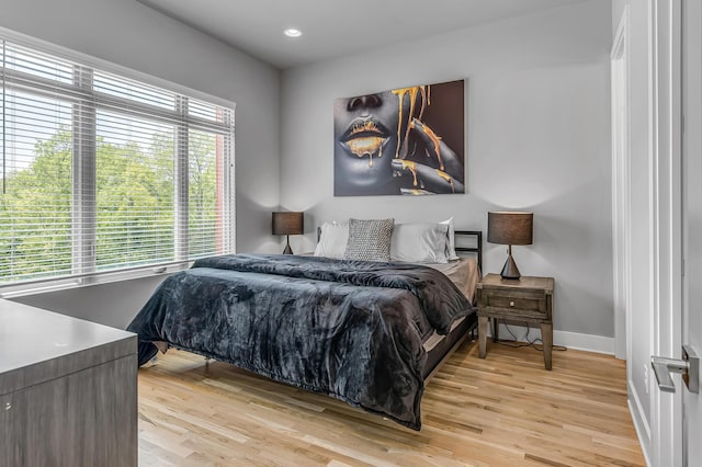 bedroom featuring light hardwood / wood-style floors