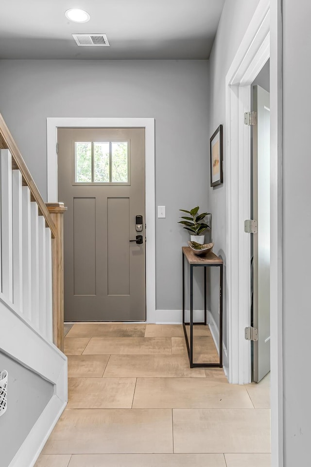 entryway with light hardwood / wood-style flooring