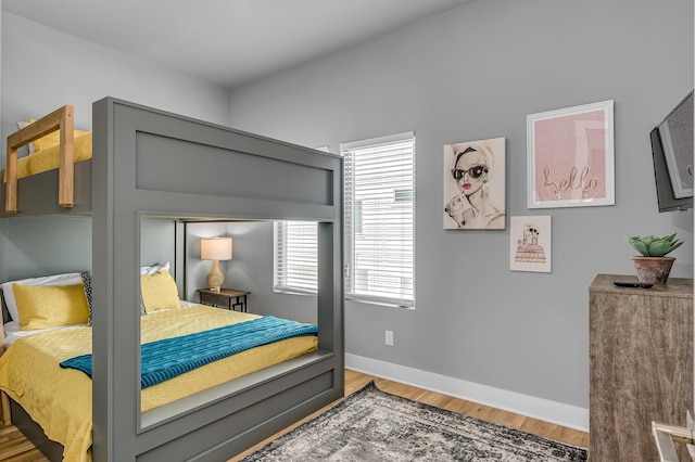 bedroom featuring hardwood / wood-style flooring