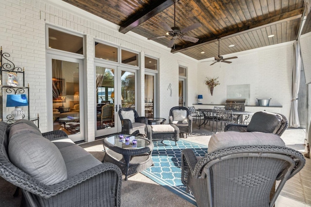 view of patio / terrace featuring an outdoor living space, ceiling fan, and a grill