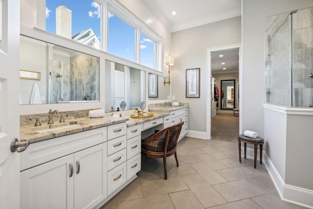 bathroom featuring tile patterned flooring, a shower with door, vanity, and ornamental molding