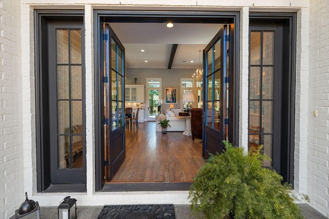 view of exterior entry featuring french doors