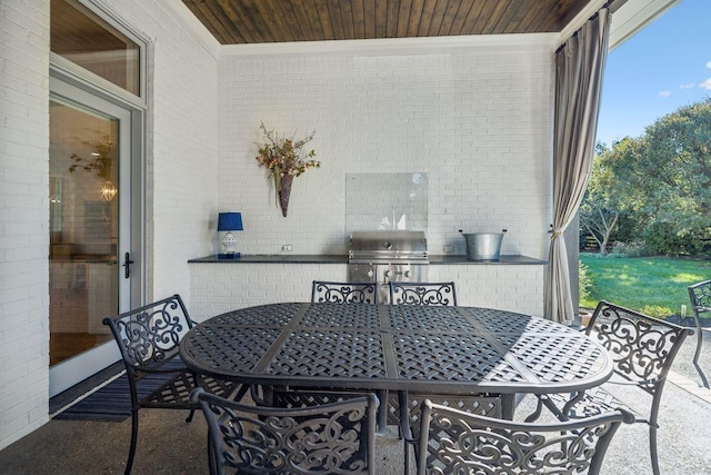 view of patio featuring grilling area and exterior kitchen