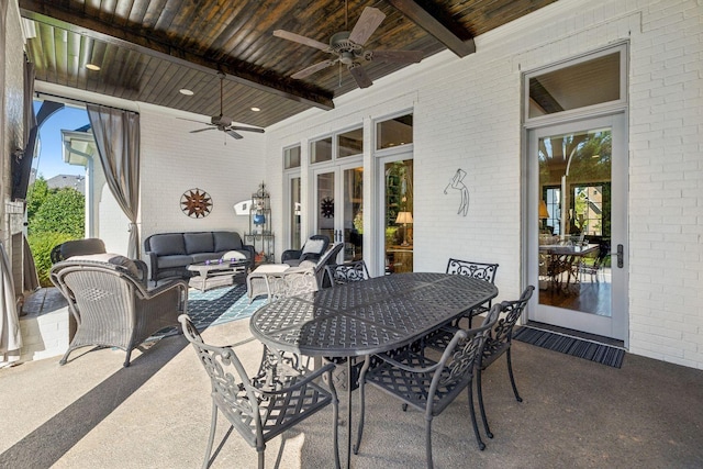 view of patio with ceiling fan and an outdoor hangout area